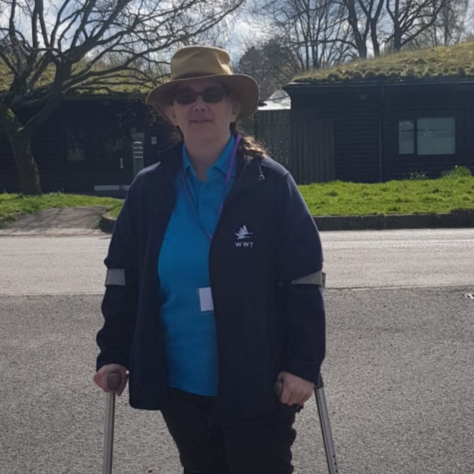 Rita, volunteer at WWT Martin Mere, standing in the car park